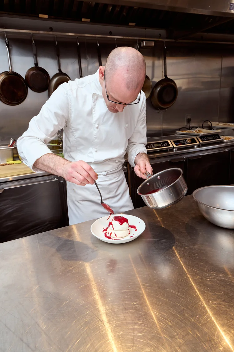 Chef presenting a course